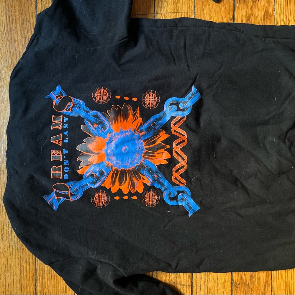 Black hoodie with orange and black details.